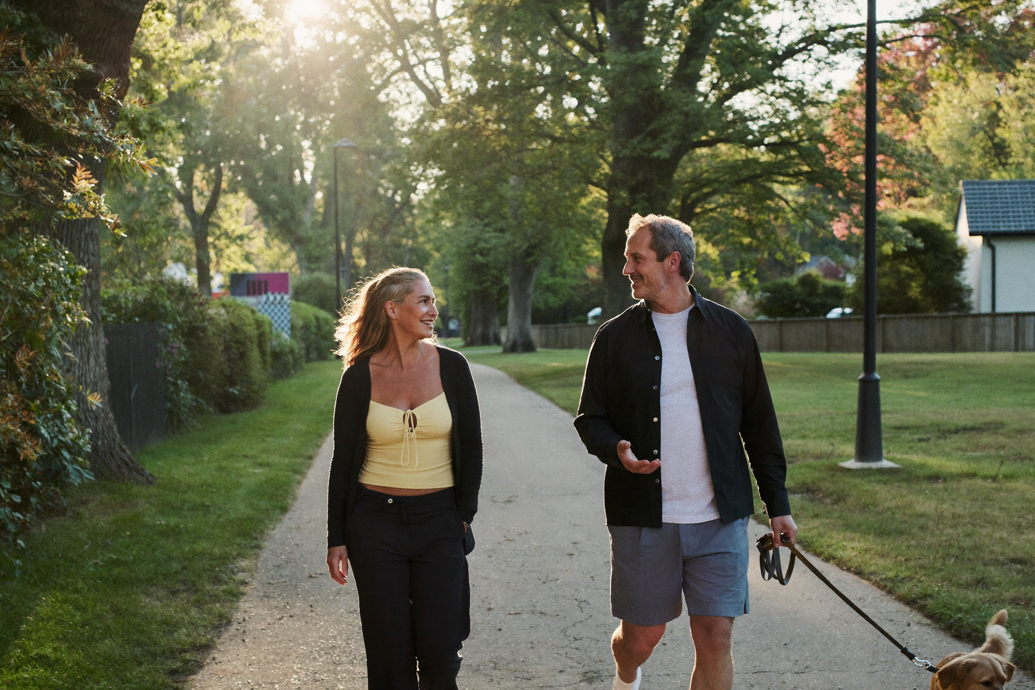 Active older couple walking comfortably outdoors
